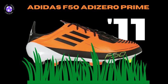 An orange, black and white Adidas F50 adizero prime soccer cleat released in 2011