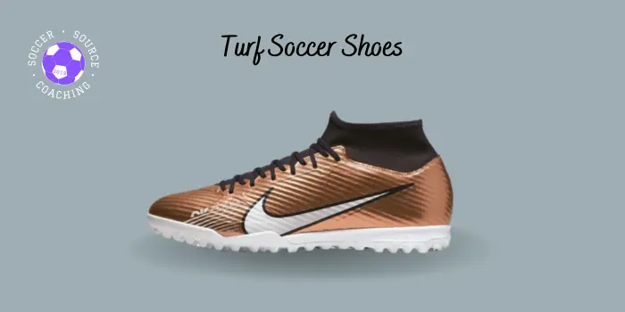 a pair of black and bronze nike turf soccer shoes