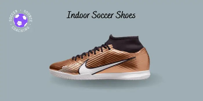 a pair of black and bronze nike indoor soccer shoes