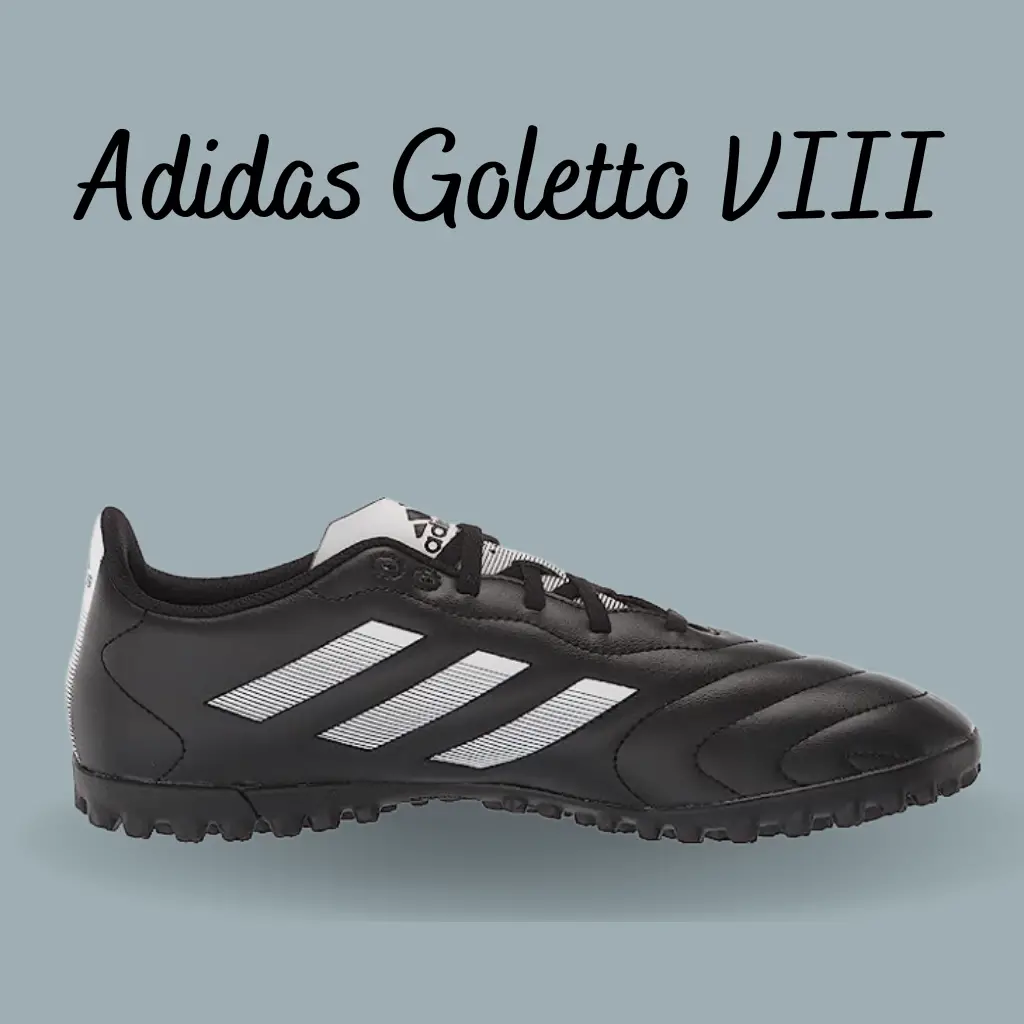 a black and white adidas goletto VIII turf soccer shoe for wide feet