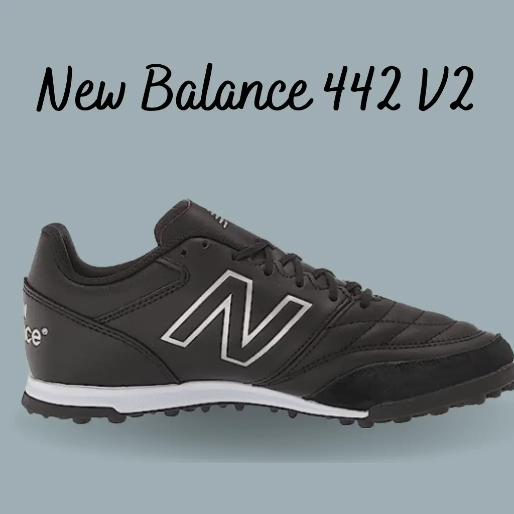 a black and new balance turf soccer shoe for wide feet